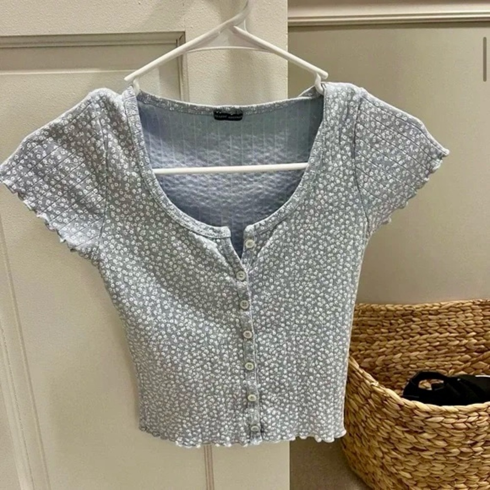 Brandy Melville light blue floral top, one size.